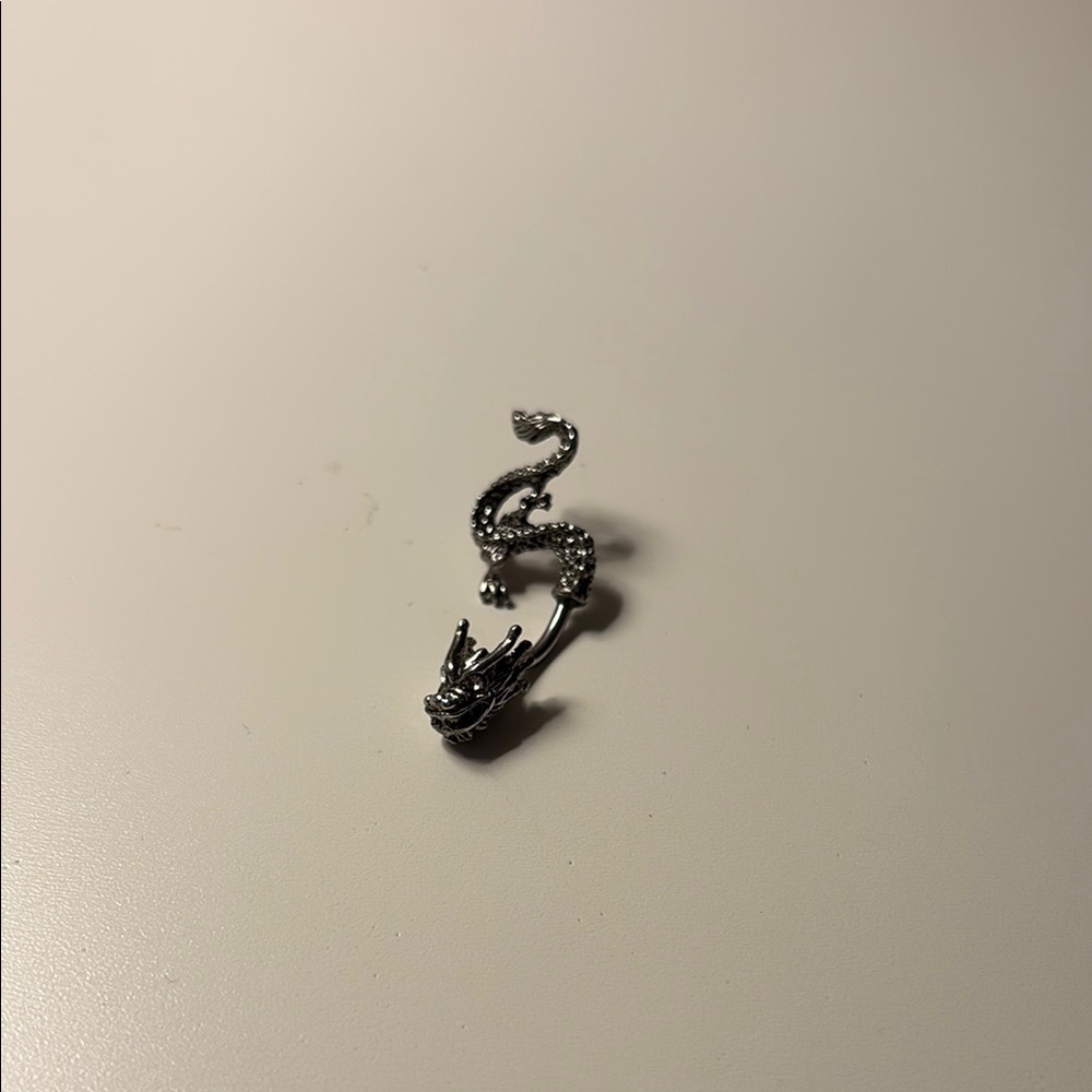Silver Dragon Belly piercing